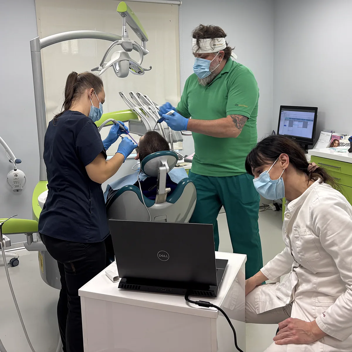 Treatment room at Ars Salutaris in Zagreb with team and patient